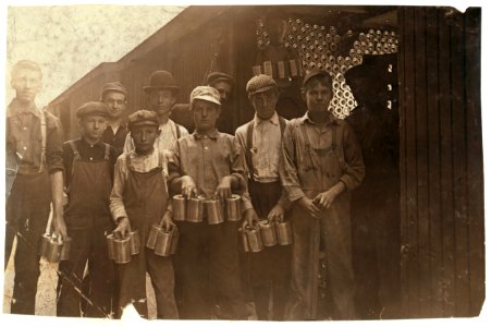 Boys in a Cannery, Indianapolis, Ind. Unloading new tomato cans from freight cars. Witness E. N. Clopper. LOC nclc.00740