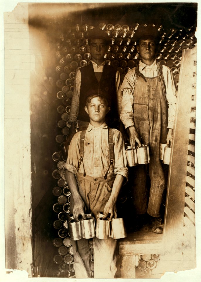 Boys Working in a Cannery, Indianapolis, Unloading freight cars full of new tomato cans. Aug., 1908. Wit., E. N. Clopper. LOC nclc.05356