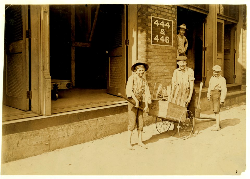 Boys, carrying home Firewood from Factory. Cincinnati. Aug. 1908. LOC nclc.01315