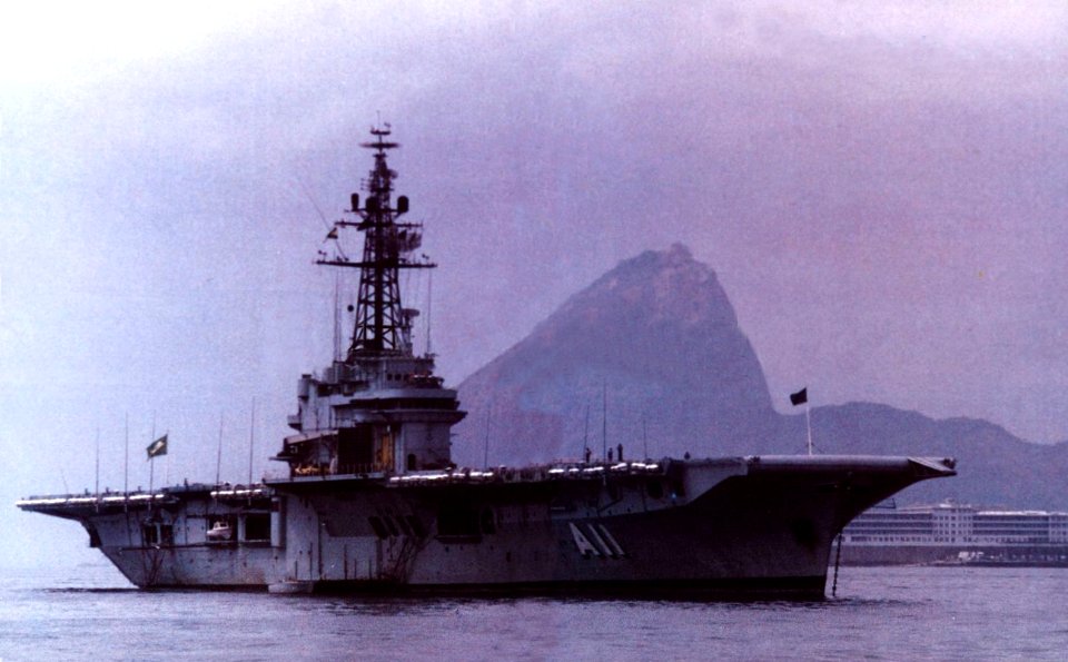 Brazilian aircraft carrier NAeL Minas Gerais (A-11) at anchor off Rio de Janeiro, Brazil, in October 1990