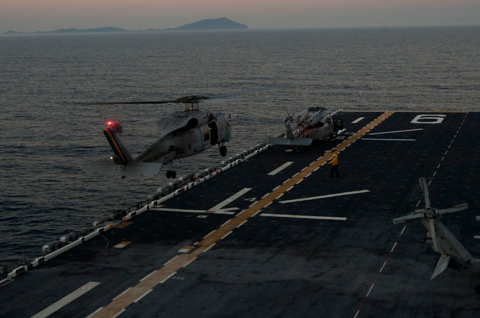 Brazilian helicopters conduct deck landing qualifications aboard PCU America 140804-N-LQ799-061