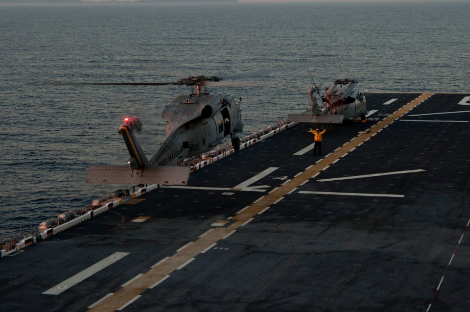 Brazilian helicopters conduct deck landing qualifications aboard PCU America 140804-N-LQ799-081