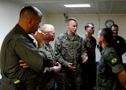 Brazilian VIPs tour USS America 140804-N-CC789-077