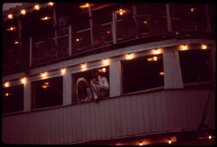 Bride-and-groom-at-wedding-reception-on-the-belle-of-louisiana-steamboat-may-1972 7651266384 o