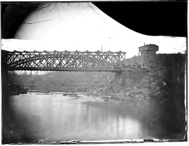 Bridge and blockhouse built by U.S. engineers - NARA - 524695 photo