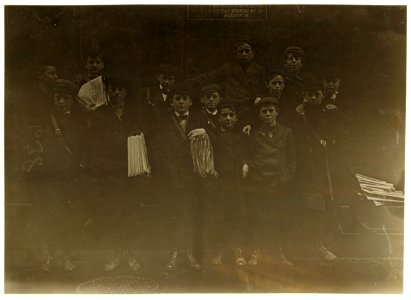 Bridgeport, Conn. Newsboys. One of the smallest has been selling for 2 years. Boy highest up on steps has been at it 6 years. LOC nclc.03277