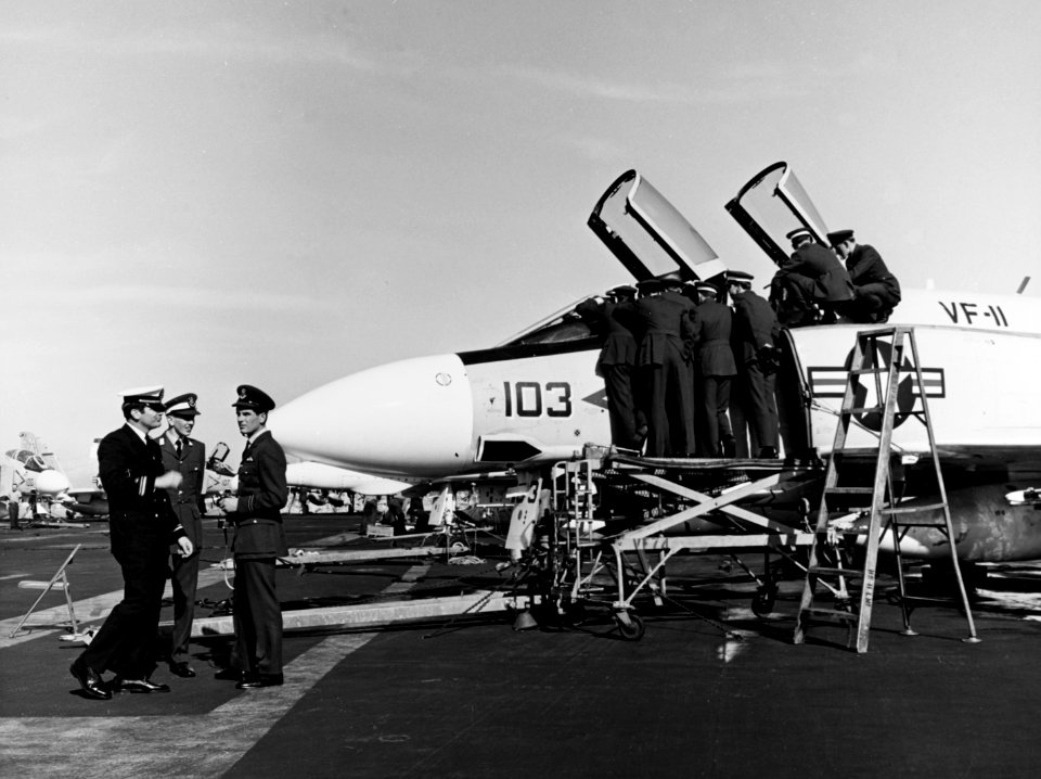 British officers inspect F-4B of VF-11 on USS Forrestal (CVA-59) in January 1970