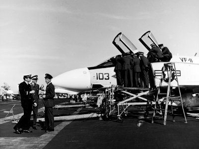 British officers inspect F-4B of VF-11 on USS Forrestal (CVA-59) in January 1970