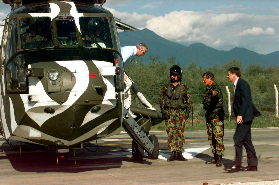 British Prime Minister John Major disembarks an Implementation Forces Sea King HAS MK 6 helicopter at the helo-pad on Ilidza Compound in Sarajevo, Bosnia and Herzegovina, during Operation JOINT ENDEAVOR