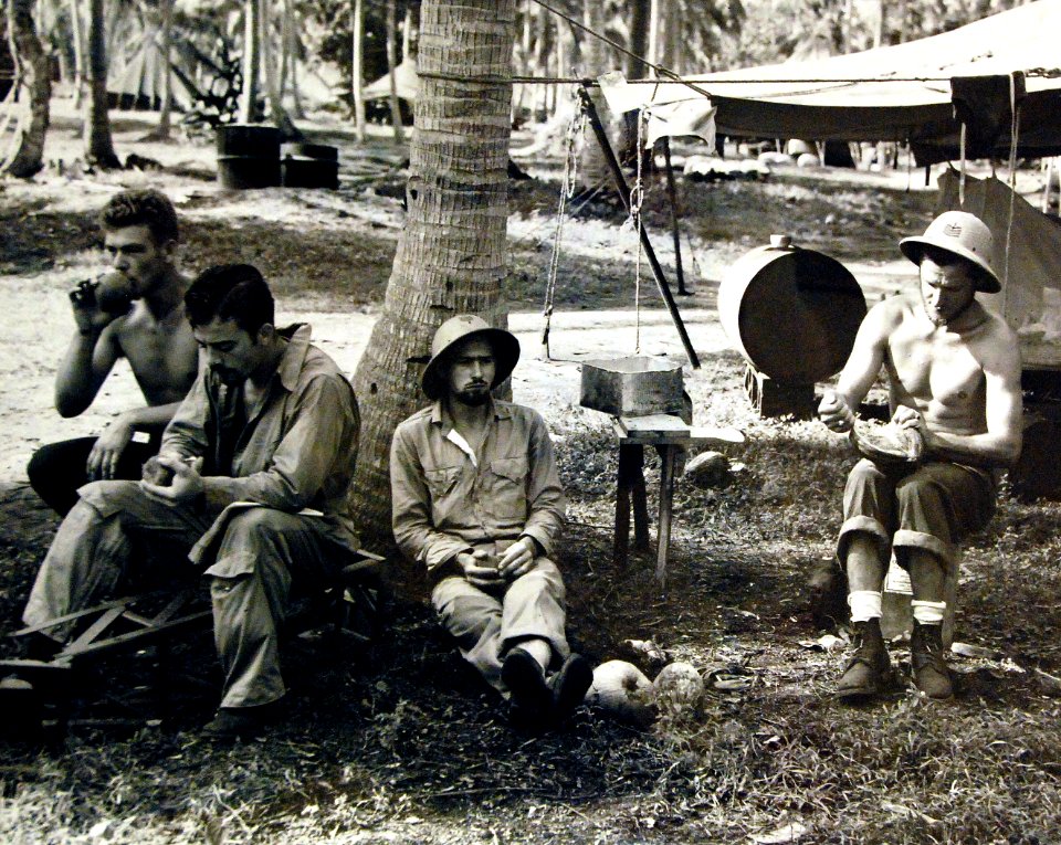 Chief Petty Officers from American warship relax and eat coconuts, South Sea Islands, 1943 (25839785433)