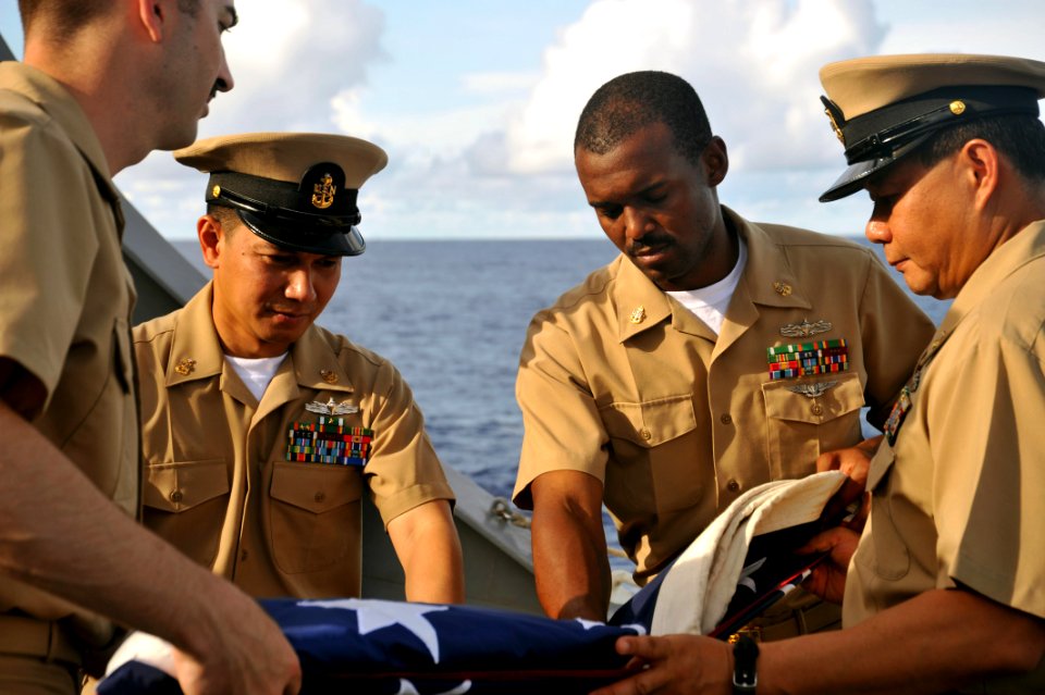 Chief petty officers fold flag 120914-N-DP652-212