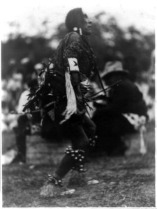 Chief Turtle giving his interpretation of the Indians' storm dance, just before the rain came down in torrents, at the Indian celebration in Two Medicine Valley, Glacier National Park, LCCN93514451