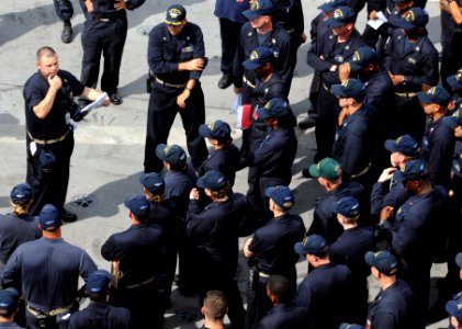 Chief Warrant Officer provides abandon ship training to Sailors on the flight deck of USS George H.W. Bush. (27834982983)