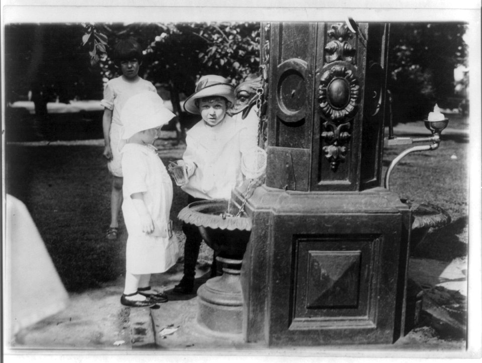 Children at a water fountain, probably in a Washington, D.C., park LCCN2001706193