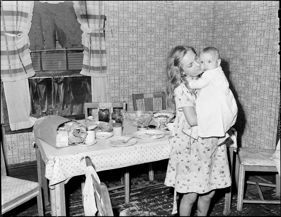 Children of Clabe Hicks, miner, Ten people, two adults and eight children live in a four room house for which they... - NARA - 541052
