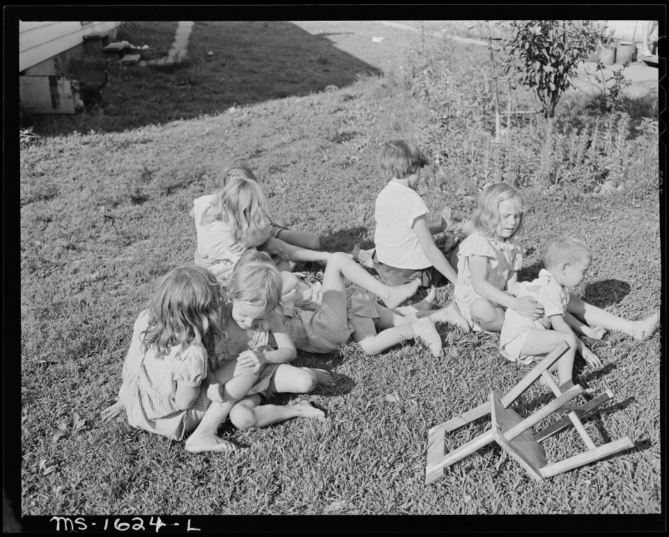 Children of miners playing on the lawn in company housing project. Koppers Coal Division, Kopperston Mine... - NARA - 540886
