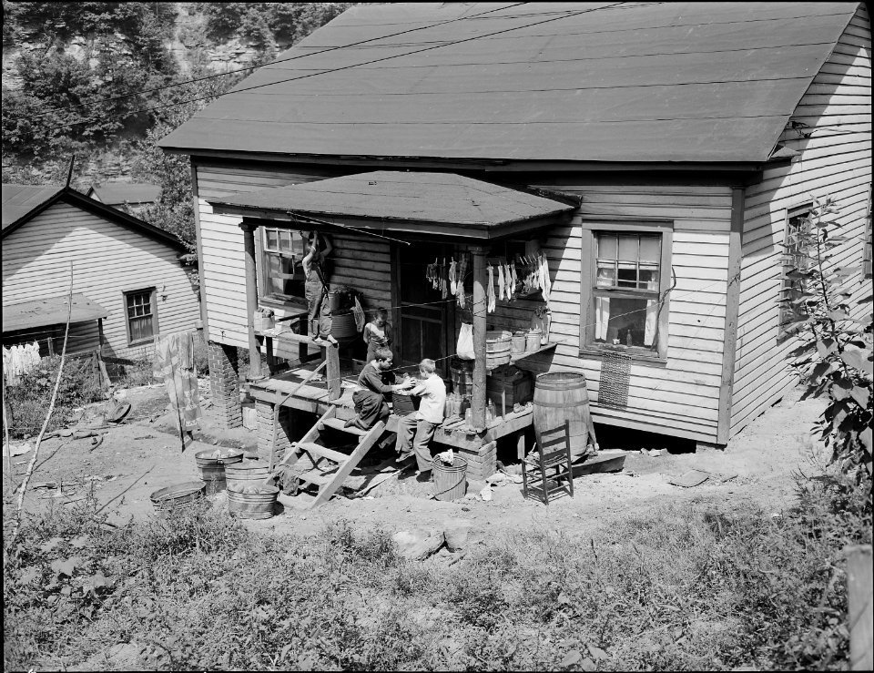 Children of miners wash jars for home canning. Southern Coal Corporation, Bradshaw Mine, Bradshaw, McDowell County... - NARA - 541043