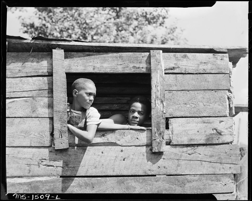 Children of miners playing in abandoned shack. Gilliam Coal and Coke Company, Gilliam Mine, Gilliam, McDowell County... - NARA - 540829