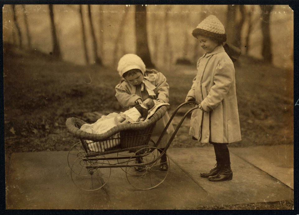Children playing with Campbell Kid dolls. See photos showing where they are made. LOC cph.3b22405