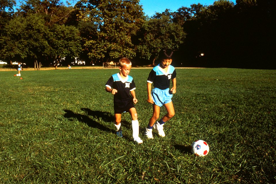 Children playing soccer