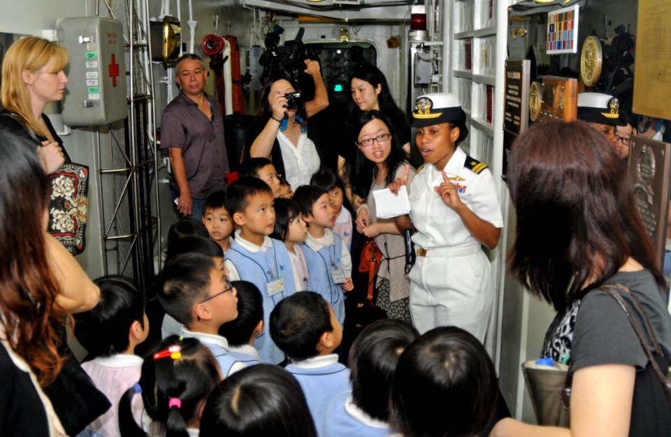 Children visit USS Peleliu 130417-N-AQ172-032