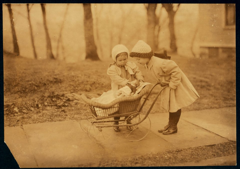 Children playing with Campbell kid dolls. LOC nclc.04210