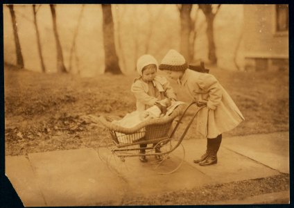 Children playing with Campbell kid dolls. LOC nclc.04210