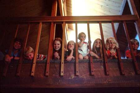 Children sitting on a staircase photo