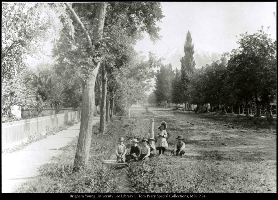 Children playing on Provo road
