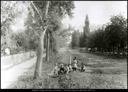Children playing on Provo road