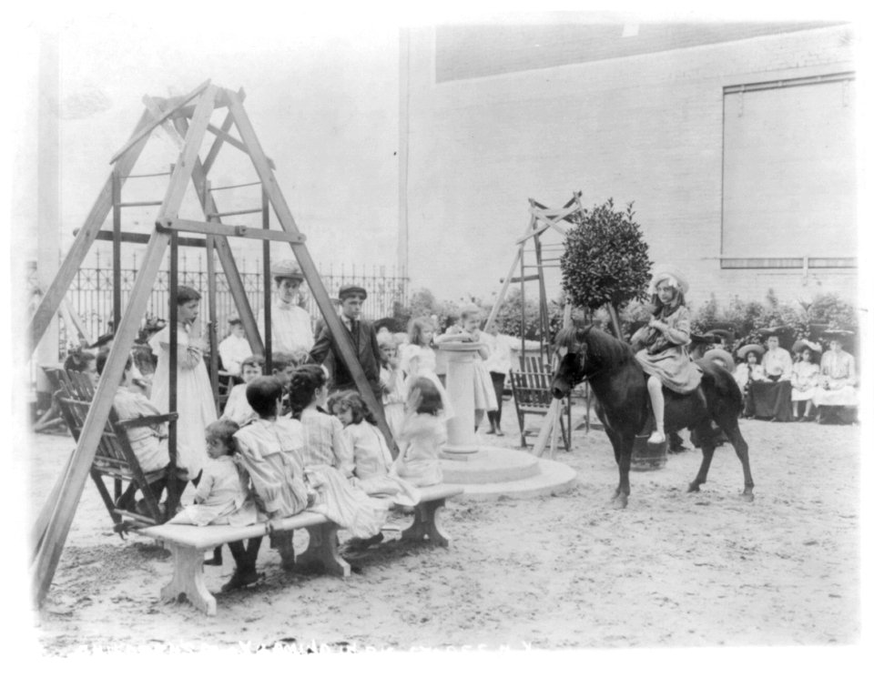Children's playground on roof of large New York store while mothers are shopping; Pony and swings LCCN2016652414