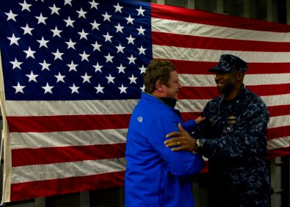Chilean distinguished visitors aboard USS America 140823-N-FR671-021