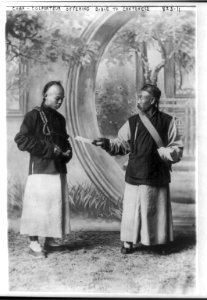 China - colporteur offering bible to Cantonese LCCN2005688531