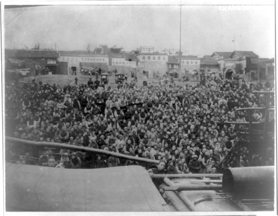 China, Changsha; mass of people at waterfront, view across boat LCCN2016651061