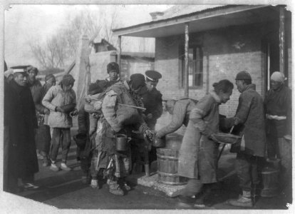 Chinese soldiers supervising distribution of famine relief rations LCCN2006675662