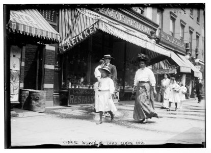 Chinese women and children in child slavery case, in street LCCN2014684082