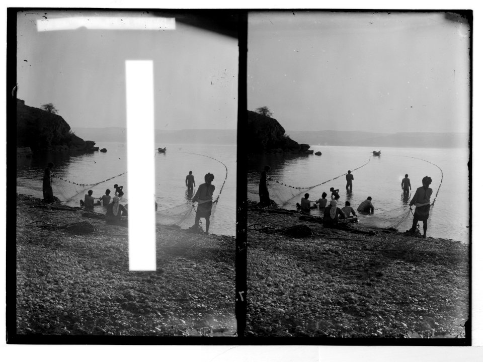 Choice set of thirteen slides, illustrating the Sea of Galilee and its fishermen still 'toiling with their nets.' Drawing in a drag-net LOC matpc.05687