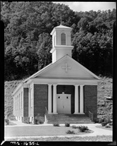 Church in company housing project for miners. Basement also serves as gathering and meeting place for Lion's Club... - NARA - 540888