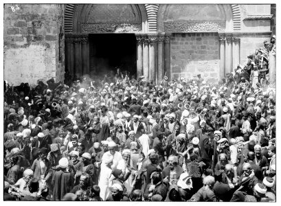 Church of the Holy Sepulchre and surroundings. Pilgrims carrying the 'Holy Fire' LOC matpc.00873