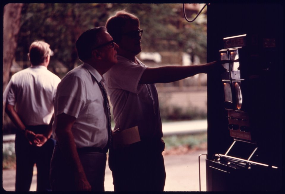City Employee of an Auto Emission Inspection Station in Downtown Cincinnati, Ohio...08-1975 (4265791209)
