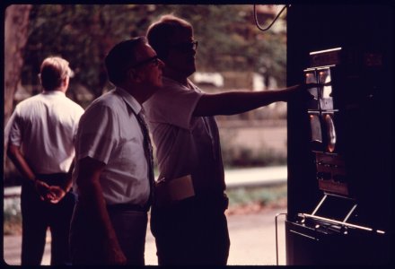 City Employee of an Auto Emission Inspection Station in Downtown Cincinnati, Ohio...08-1975 (4265791209)