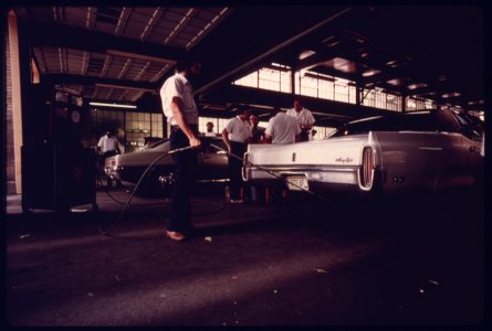 City Employee of an Auto Emission Inspection Station in Downtown Cincinnati, Ohio...08-1975 (4266536192)