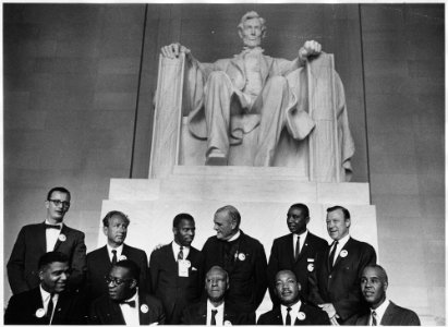 Civil Rights March on Washington, D.C. (Leaders of the march posing in front of the statue of Abraham Lincoln... - NARA - 542063 photo