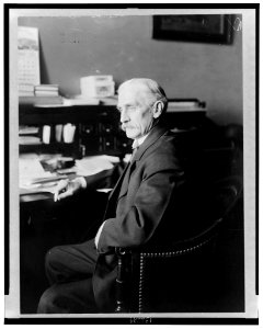 Clarence Clark, three-quarter-length portrait, seated at desk, facing left LCCN2002722609