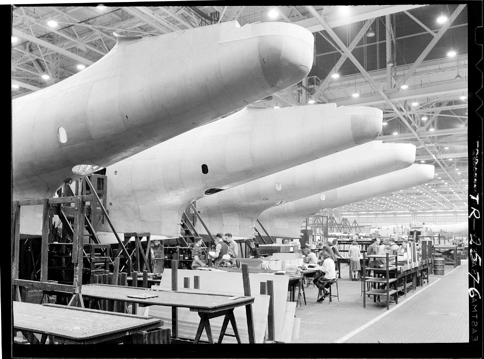 Construction of aircraft at the Glenn L. Martin plant at Baltimore, MD. Fuselages, just out of the assembly jigs are... - NARA - 520743