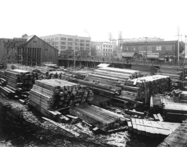 Construction of Great Northern Railroad tunnel beneath downtown Seattle showing the material yard at south end, site of King (CURTIS 2092)