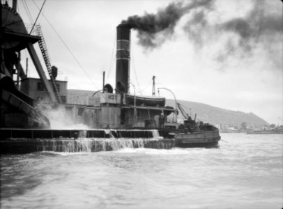Construction of the Haifa harbour. Dredger in the Haifa harbour. Hard at work deepening harbour area LOC matpc.15387