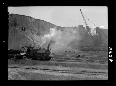 Construction of the Haifa harbour. The Haifa harbour. The Athlit quarries. Locomotives and cranes at work LOC matpc.15386
