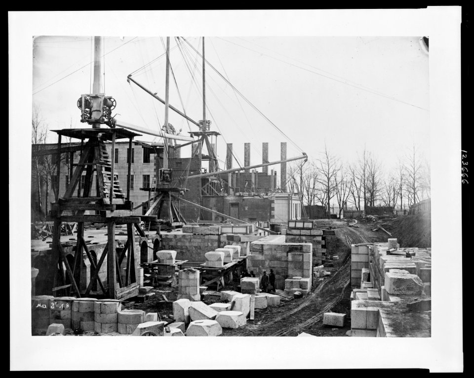 Construction of the United States Treasury Building, Washington, D.C., showing construction equipment and building materials LCCN00652408