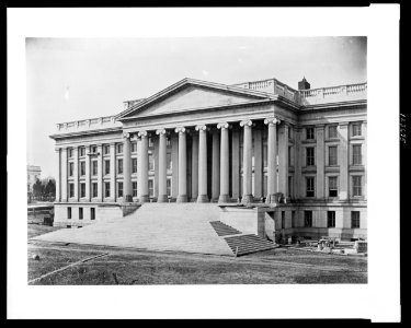 Construction of the United States Treasury Building, Washington, D.C., showing construction of the front steps and columns LCCN00652417